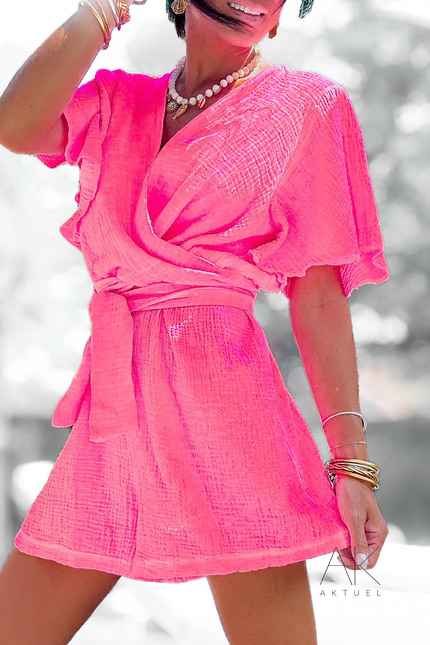 Combinaison short en gaze de coton rose fluo