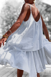 Robe blanche fluide à volants