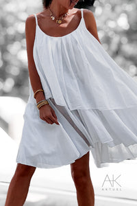 Robe blanche fluide à volants