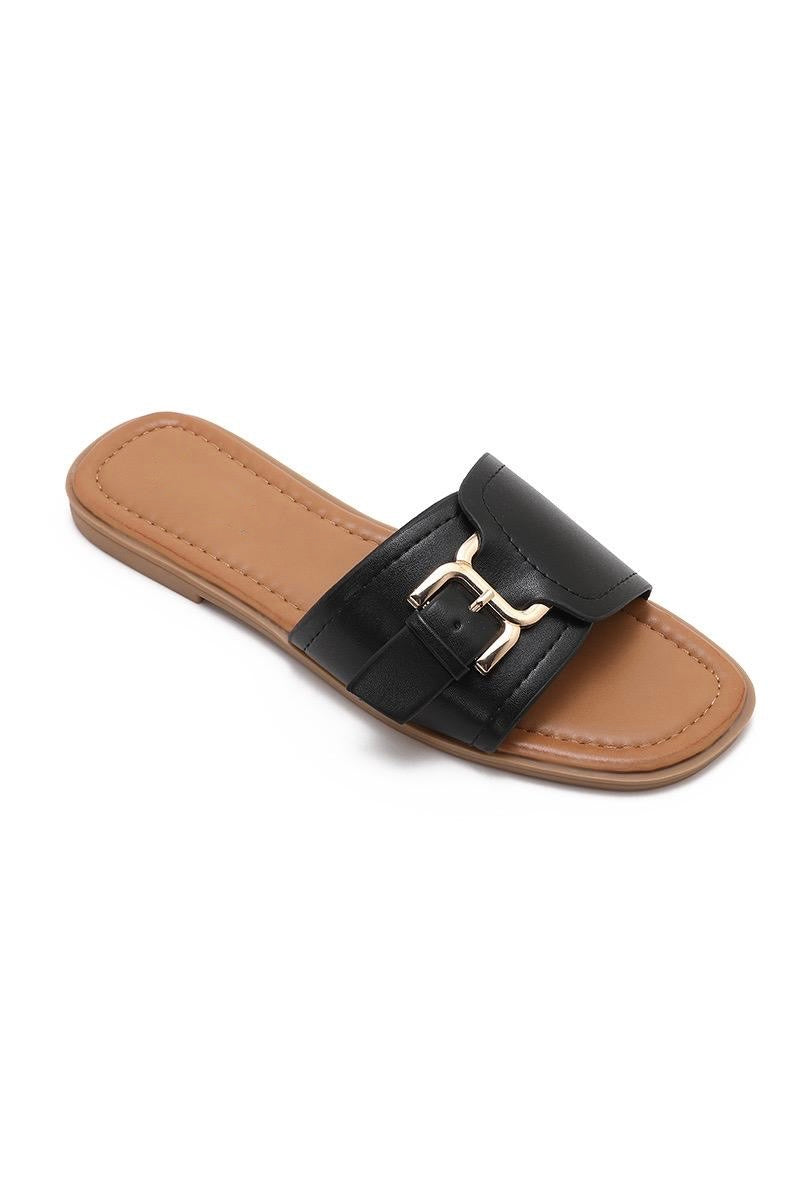 Mules noires plates à boucle dorée