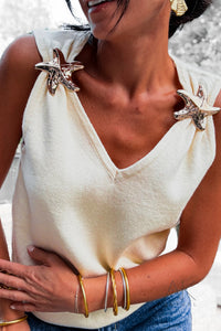 Top en maille col V avec broche étoile