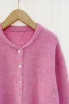 Cardigan en maille rose