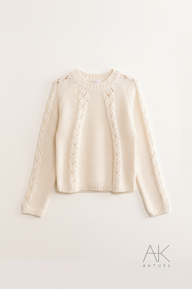 Pull écru en maille torsadée