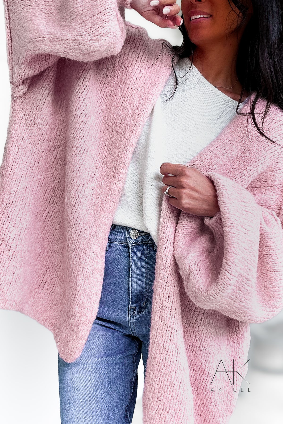 Cardigan long rose en maille épaisse