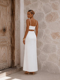 Robe longue cérémonie blanche à découpes