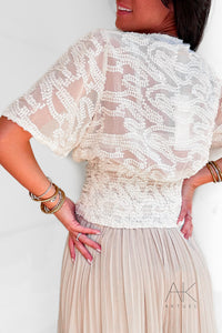 Top blanc texturé en relief