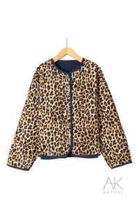 Veste matelassée bleu marine réversible léopard