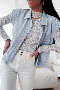 Veste sans manches en jean bleu délavé