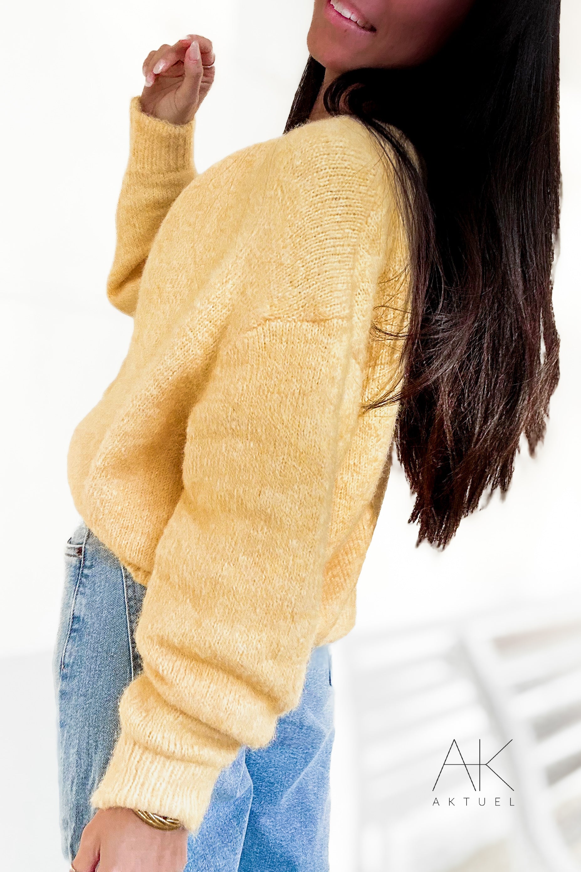 Cardigan en maille jaune pastel