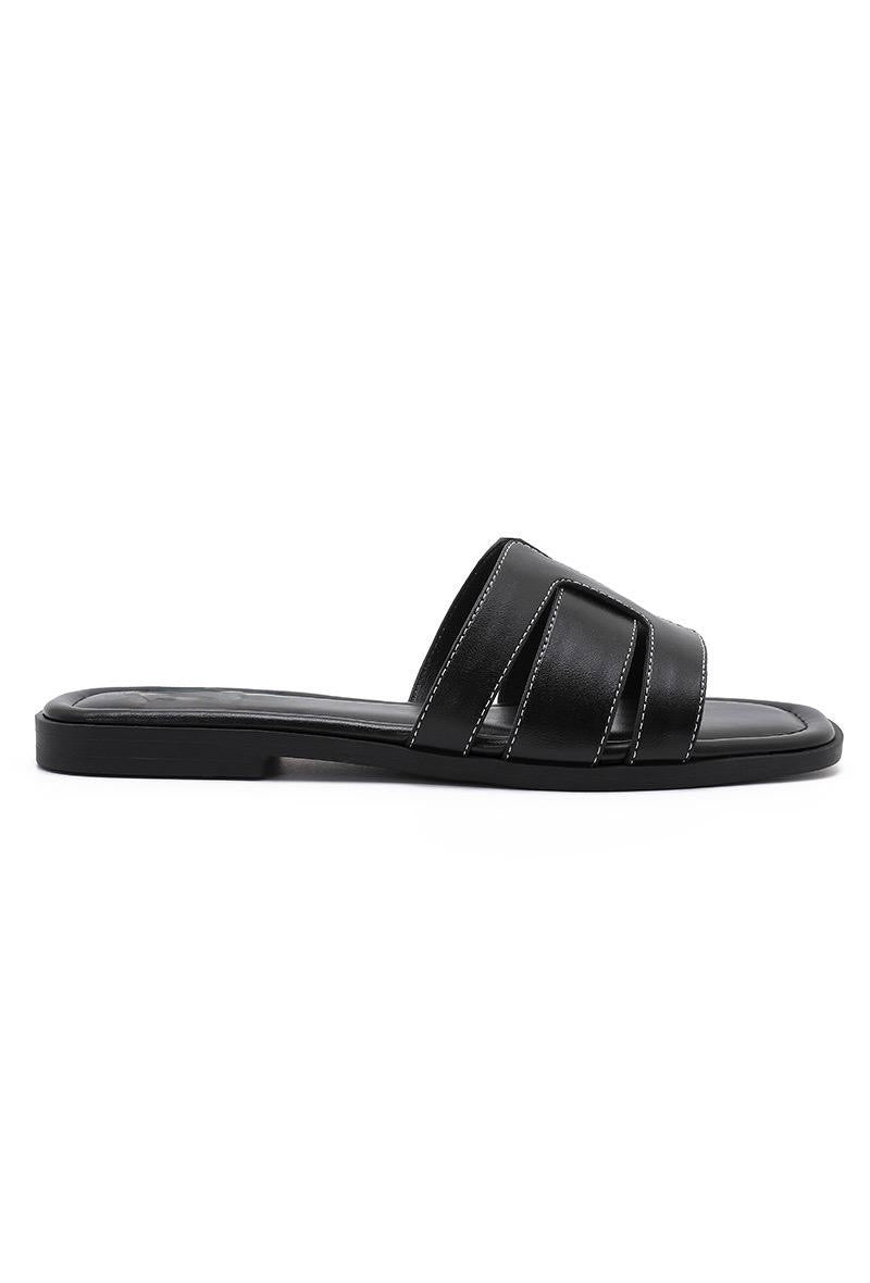 Mules noires à bride ajourée