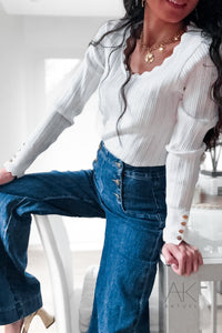 Pull fin blanc à maille ajourée