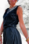 Top sans manches noir en broderie anglaise