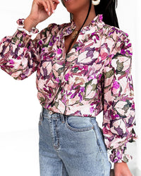 Blouse fleurie rose et violet – Col volanté et manches bouffantes