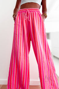 Pantalon large en gaze de coton à rayures fuschia et orange