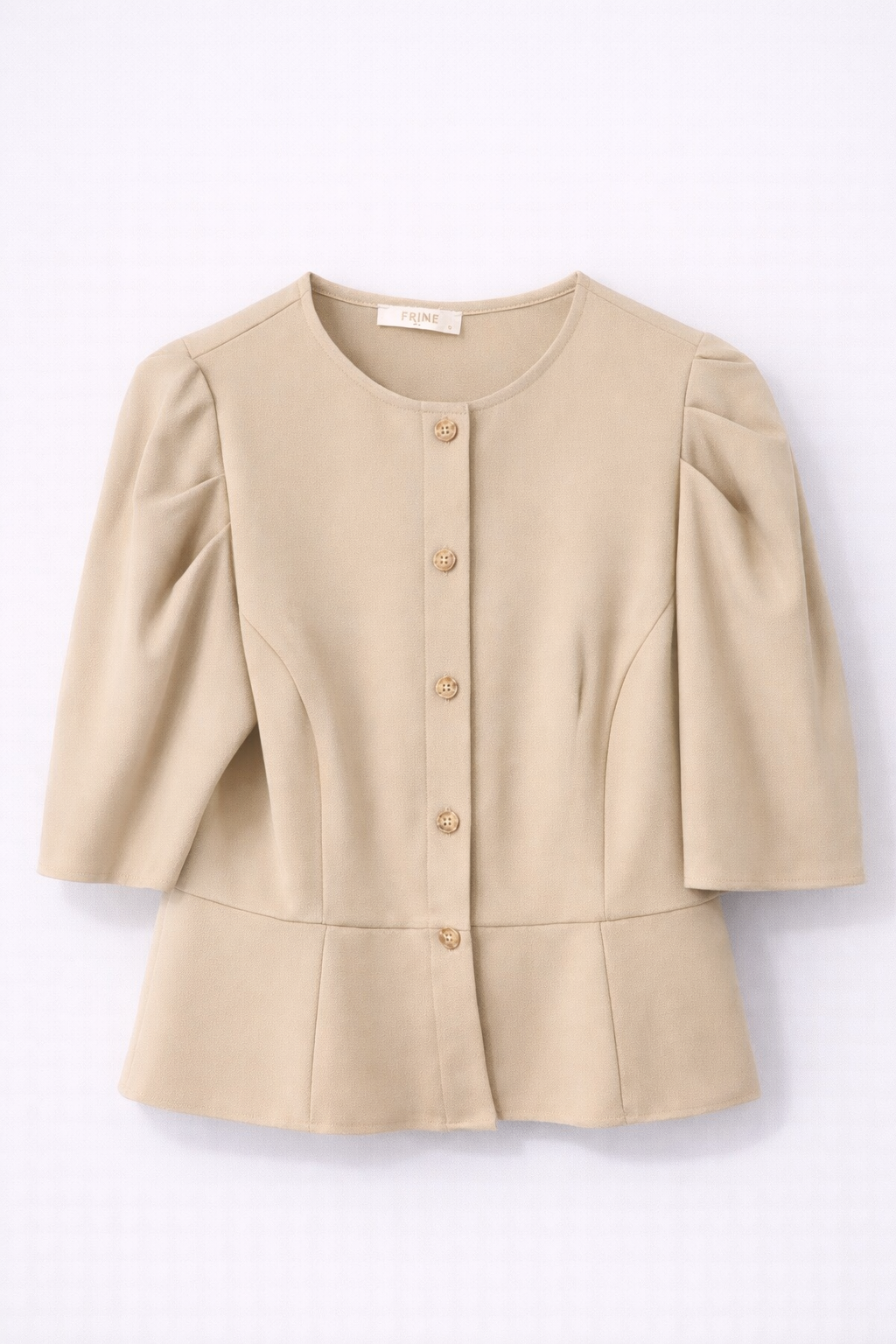 Blouse beige structurée manches bouffantes