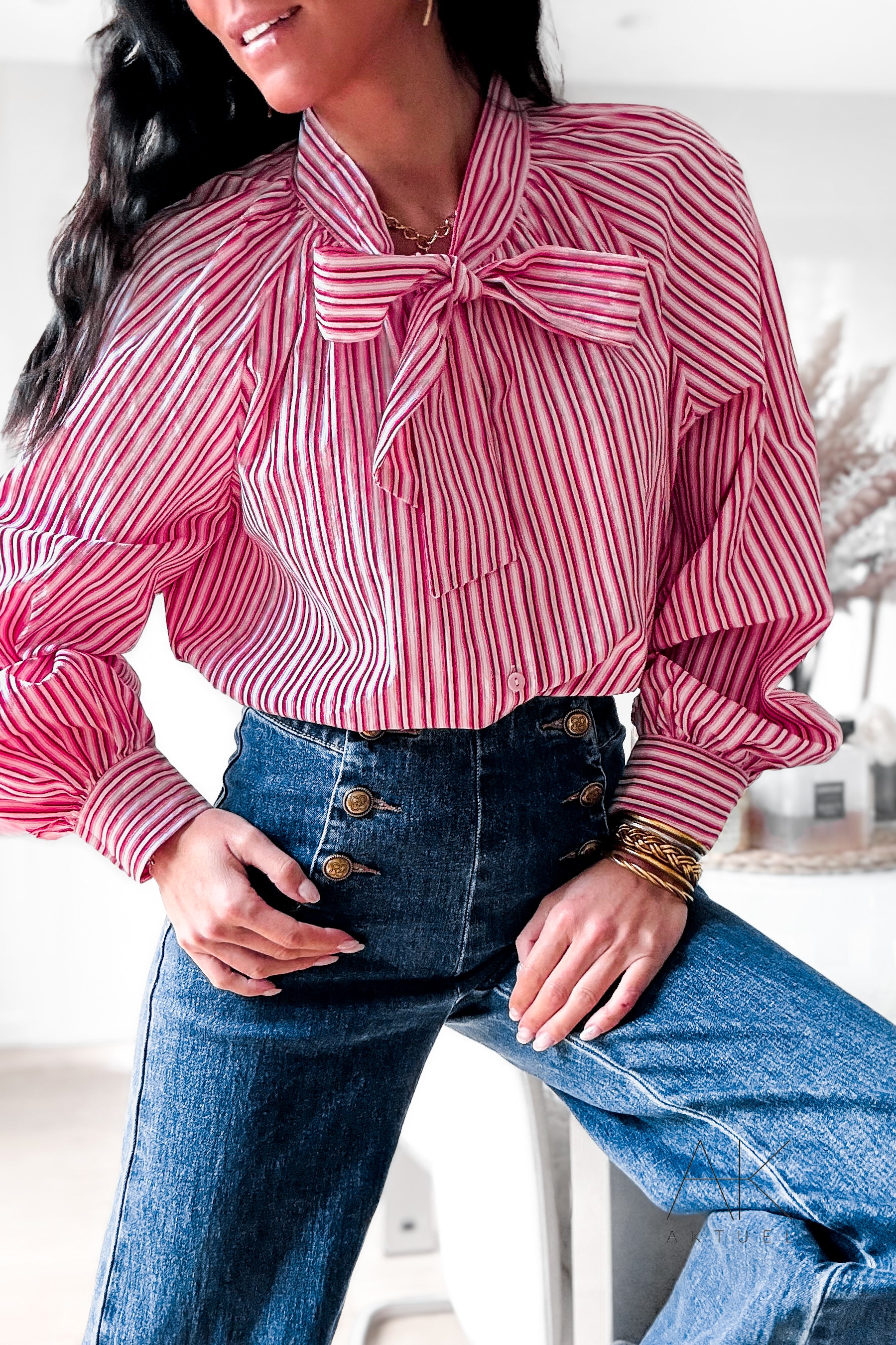 Chemise rayée rouge et rose à col volanté