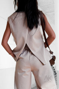 Gilet sans manches à boutons bijoux
