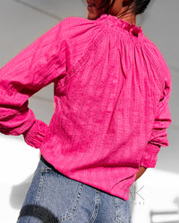 Chemise fuchsia à détails ajourés