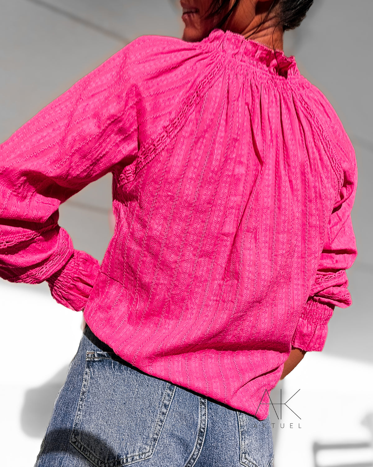Chemise fuchsia à détails ajourés