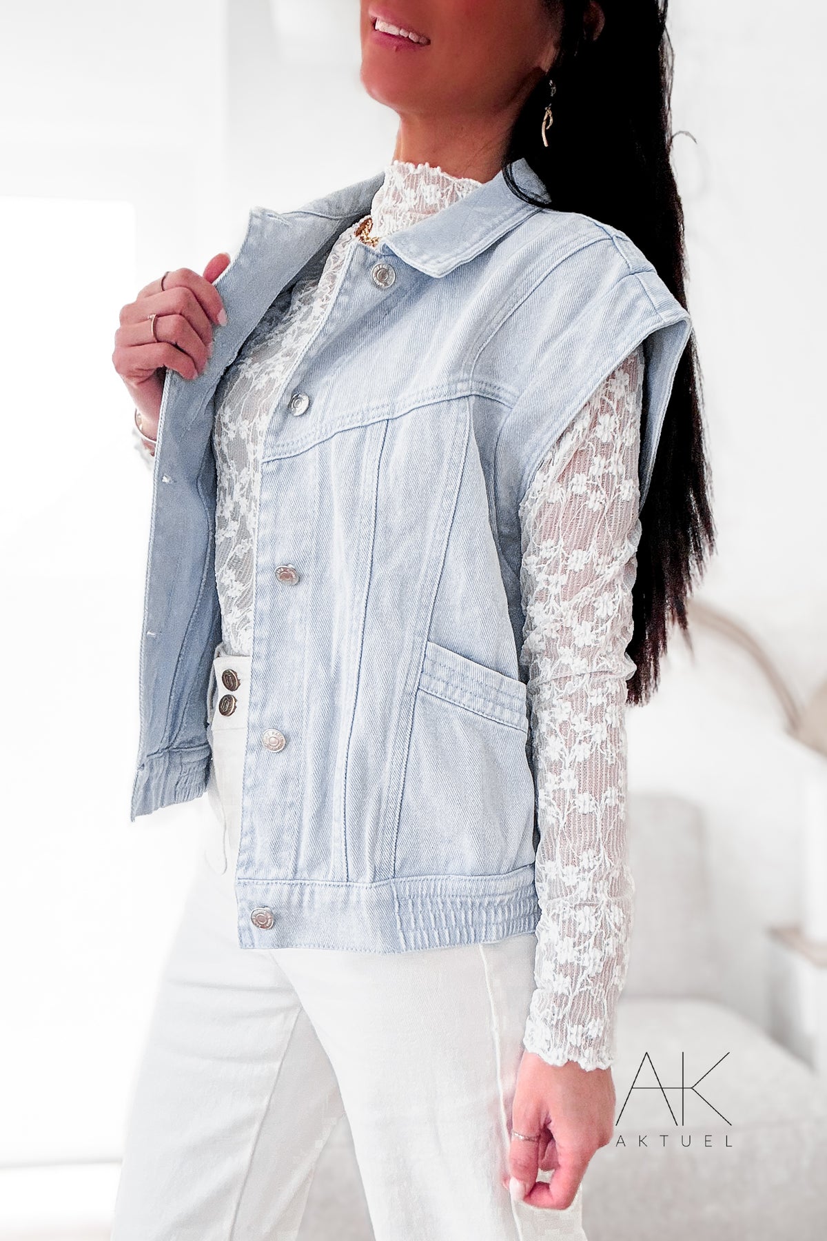 Veste sans manches en jean bleu délavé