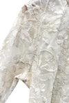 Top en dentelle brodée blanche