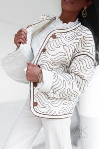 Veste matelassée crème à motifs ondulés