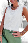 Top sans manches blanc en broderie anglaise