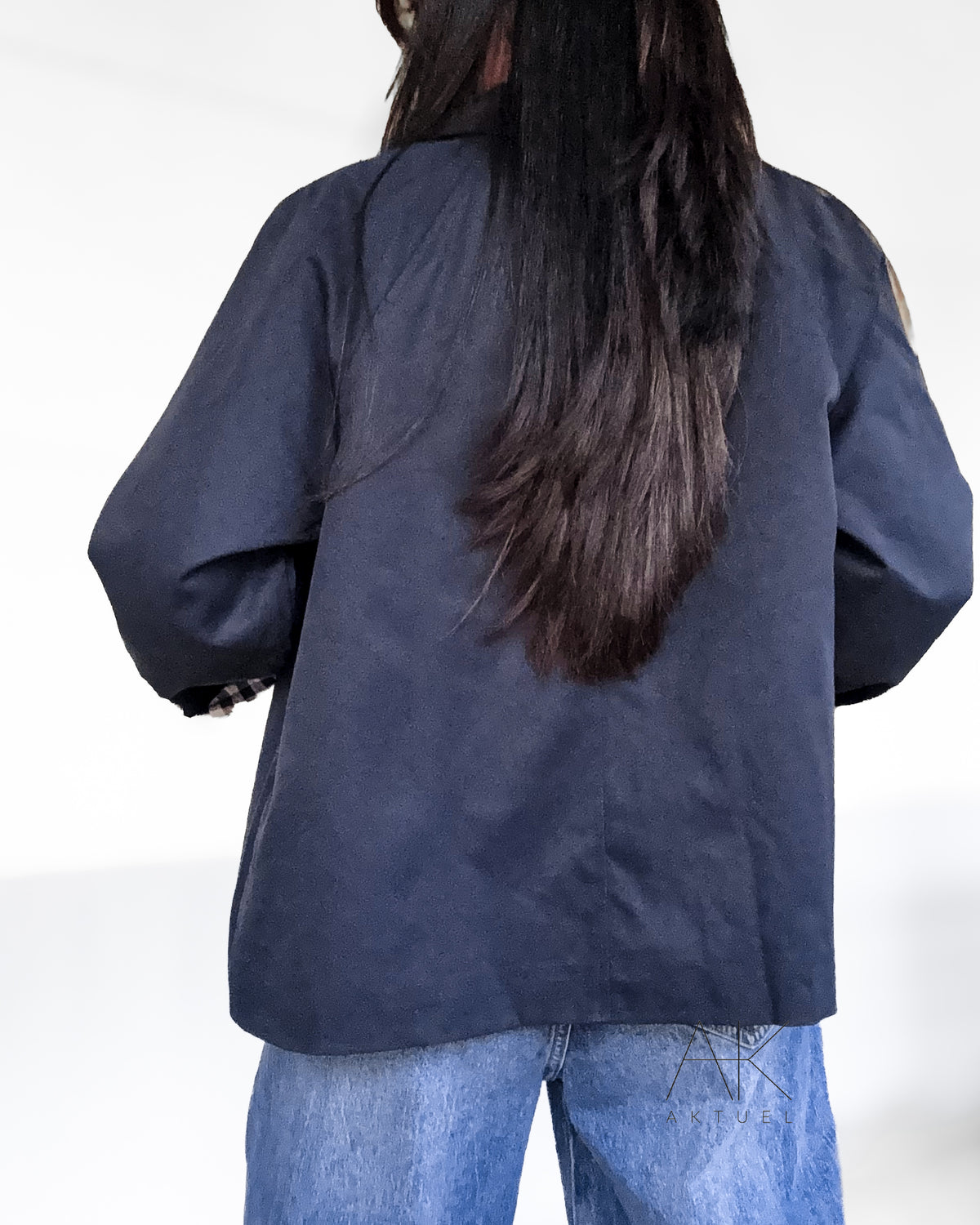 Veste trench courte bleu à revers carreaux