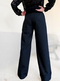 Pantalon noir taille haute à pinces