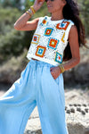 Top sans manches en crochet bleu, orange et jaune