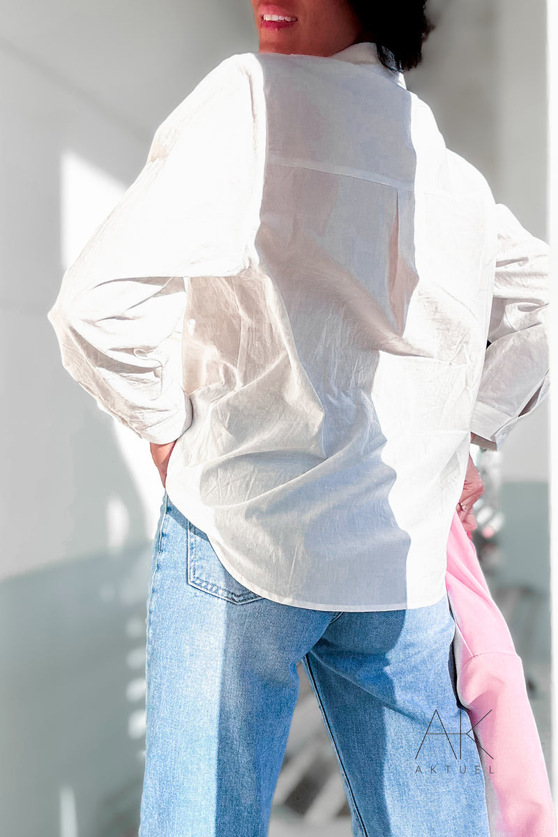 Chemise blanche à poche brodée