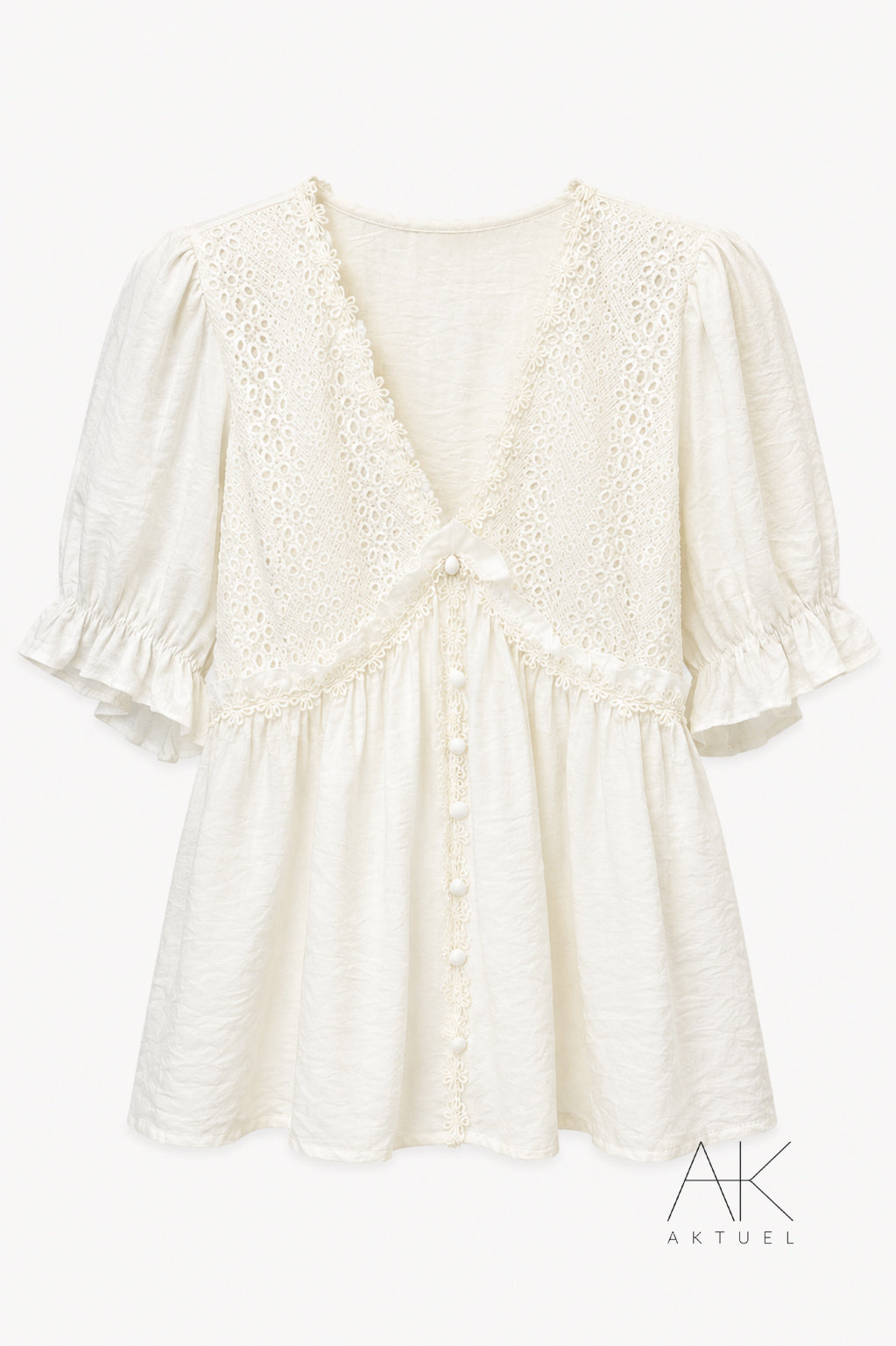 Blouse brodée en coton écru