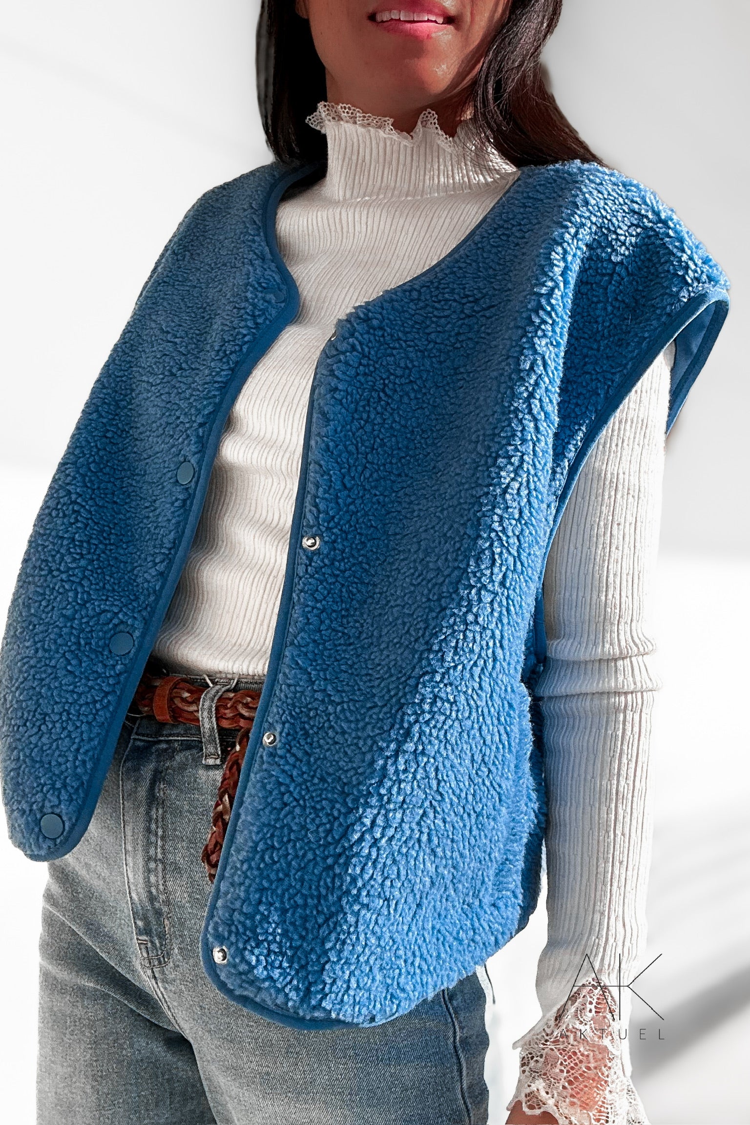 Gilet sans manches en sherpa bleu