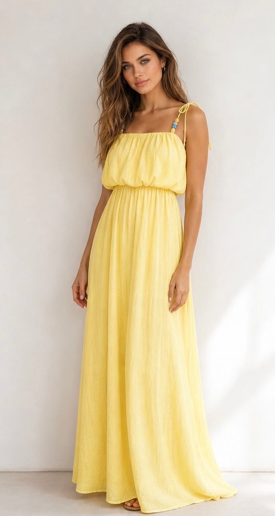 Robe longue jaune soleil à bretelles perlées