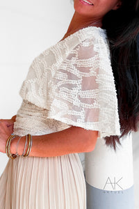 Top blanc texturé en relief