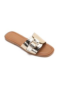 Mules dorées plates à boucle dorée