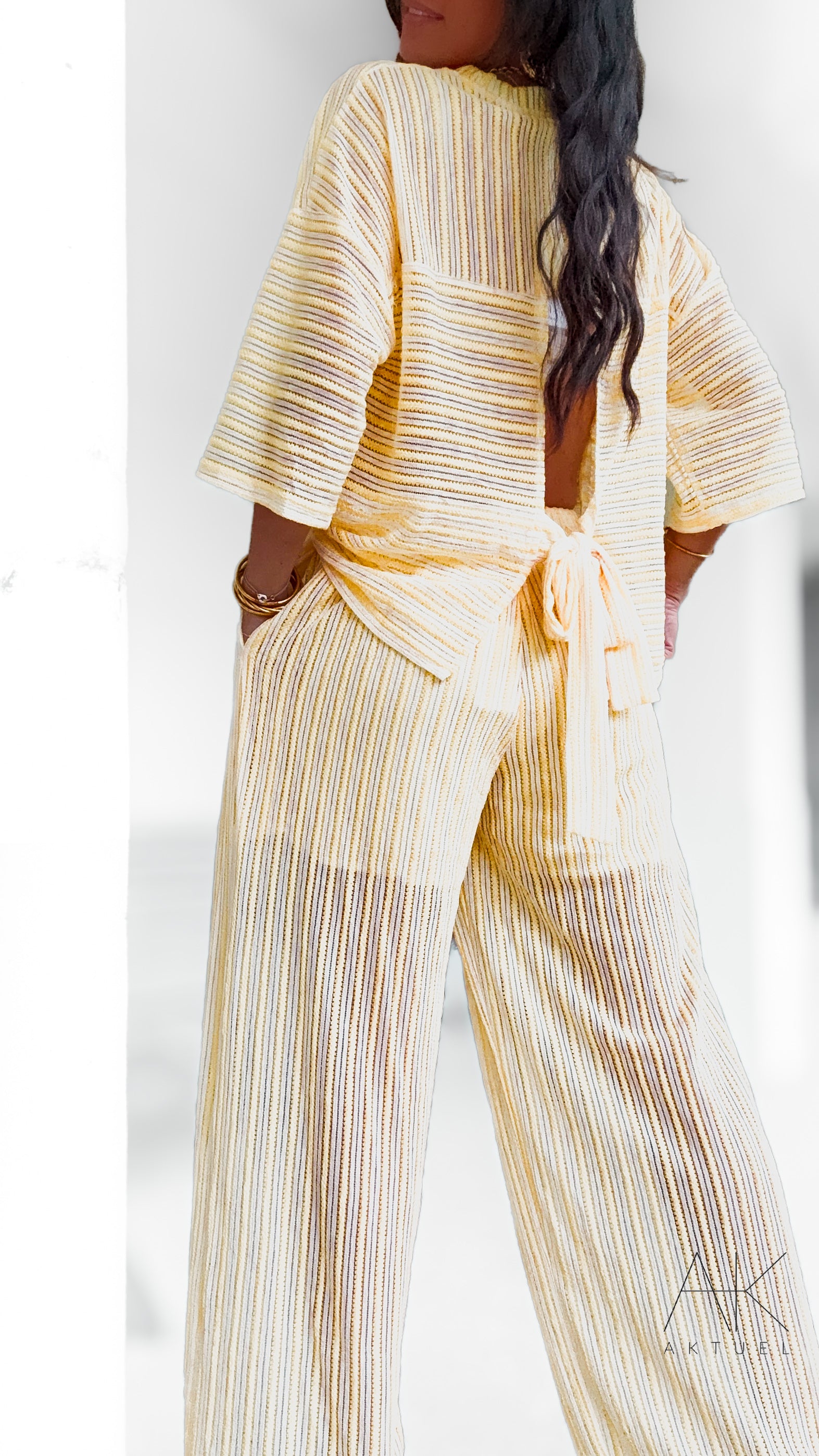 Pantalon maille rayé jaune pastel