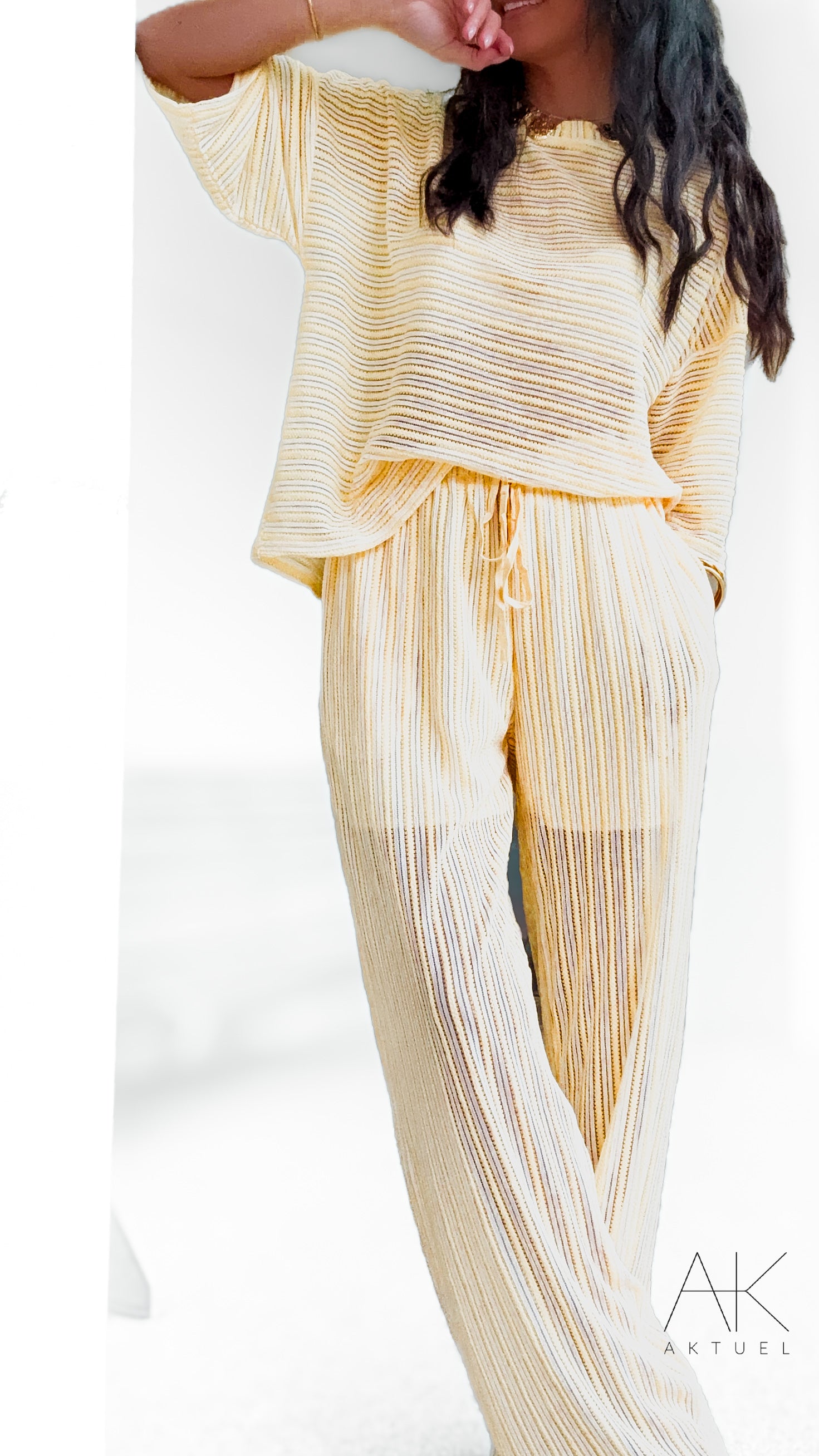 Pantalon maille rayé jaune pastel