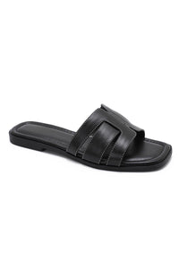 Mules noires à bride ajourée