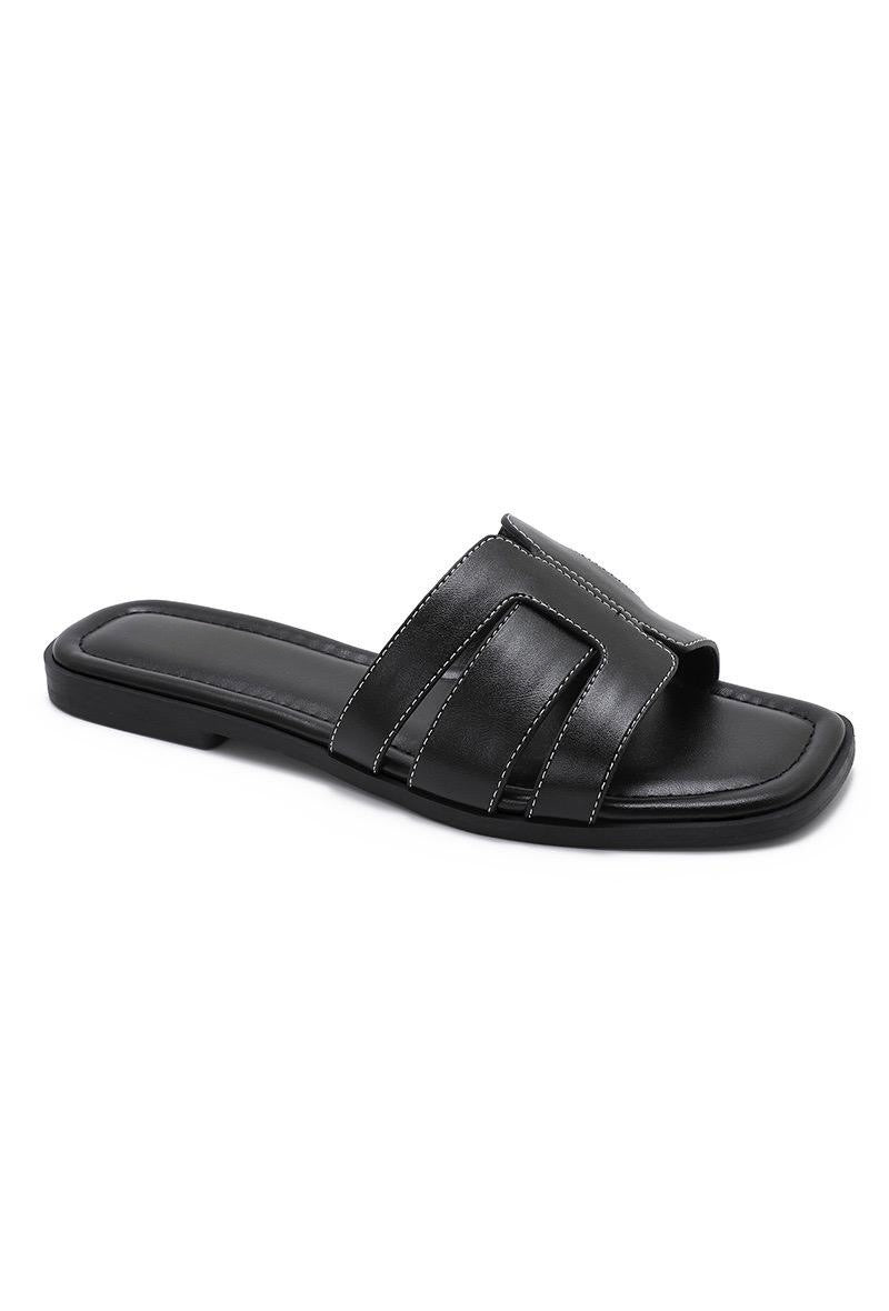 Mules noires à bride ajourée
