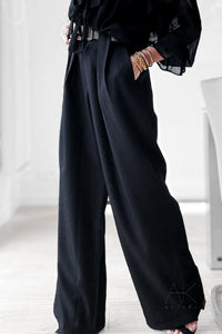 Pantalon noir ceinturé