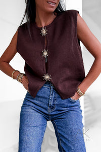 Top en maille marron sans manches broches soleil