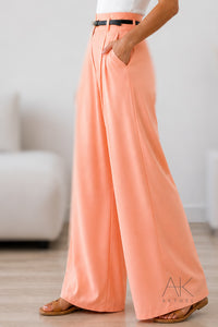 Pantalon orange saumon coupe large