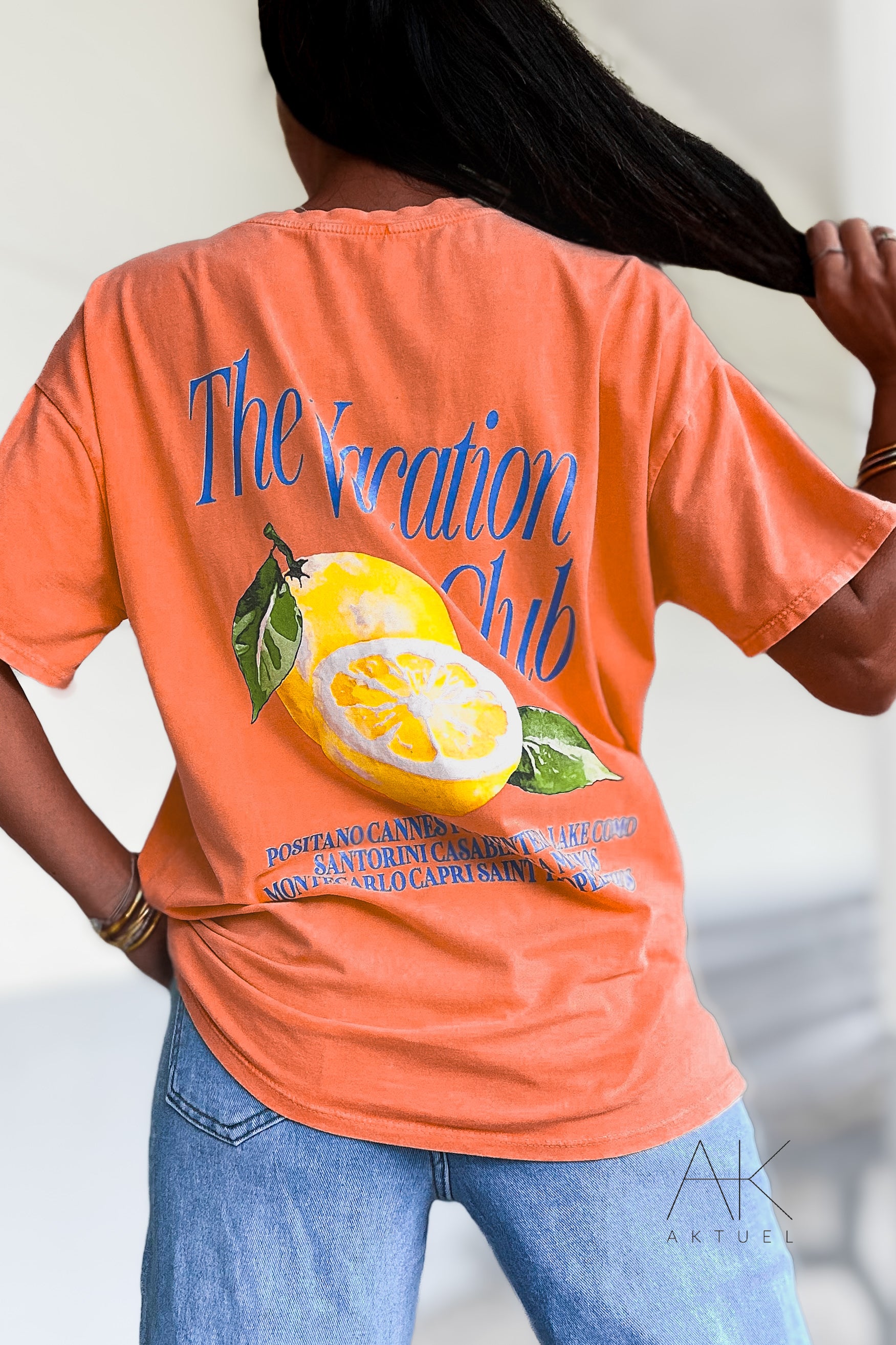 T-shirt orange imprimé "The Vacation Club"