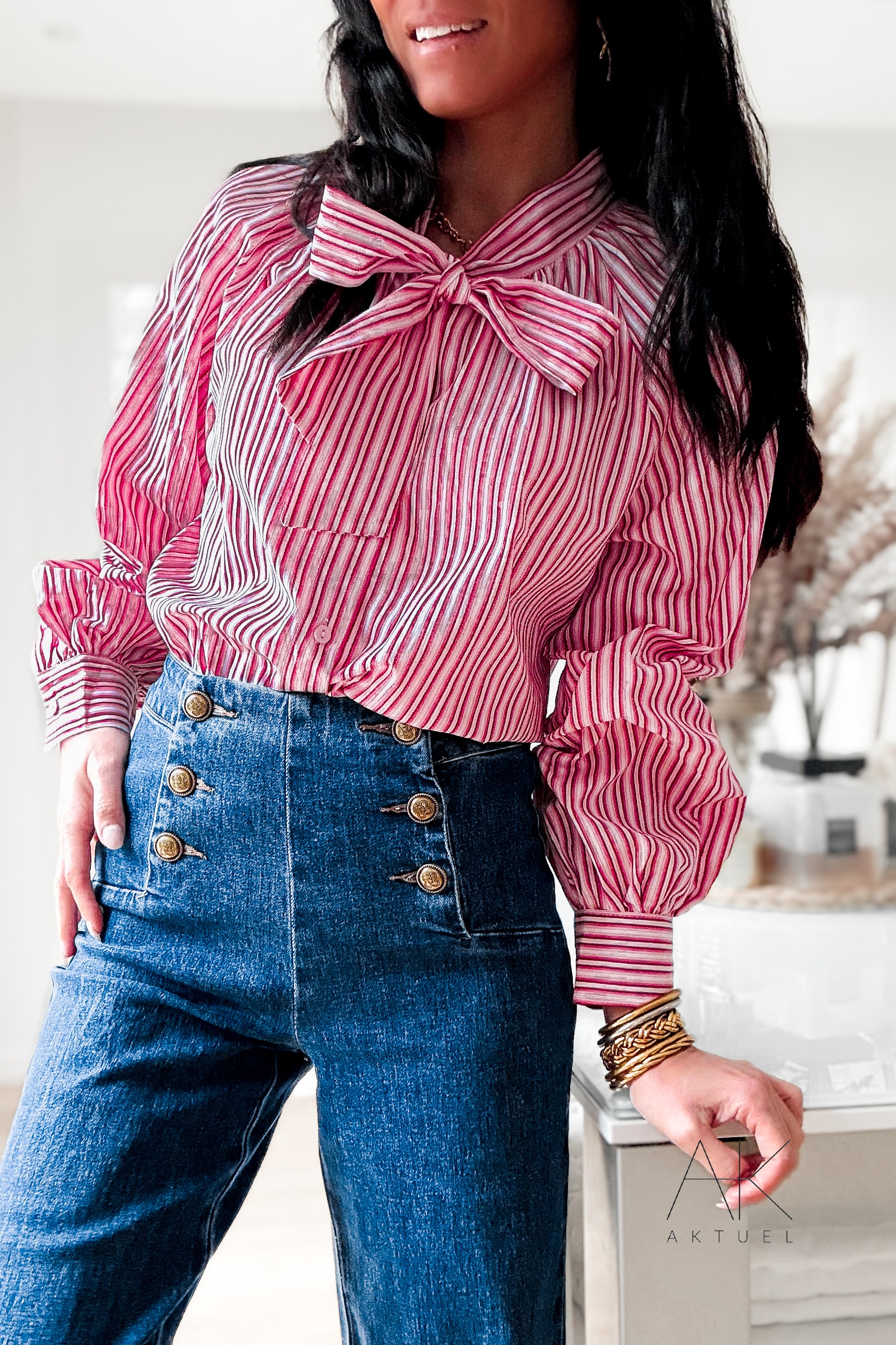 Chemise rayée rouge et rose à col volanté