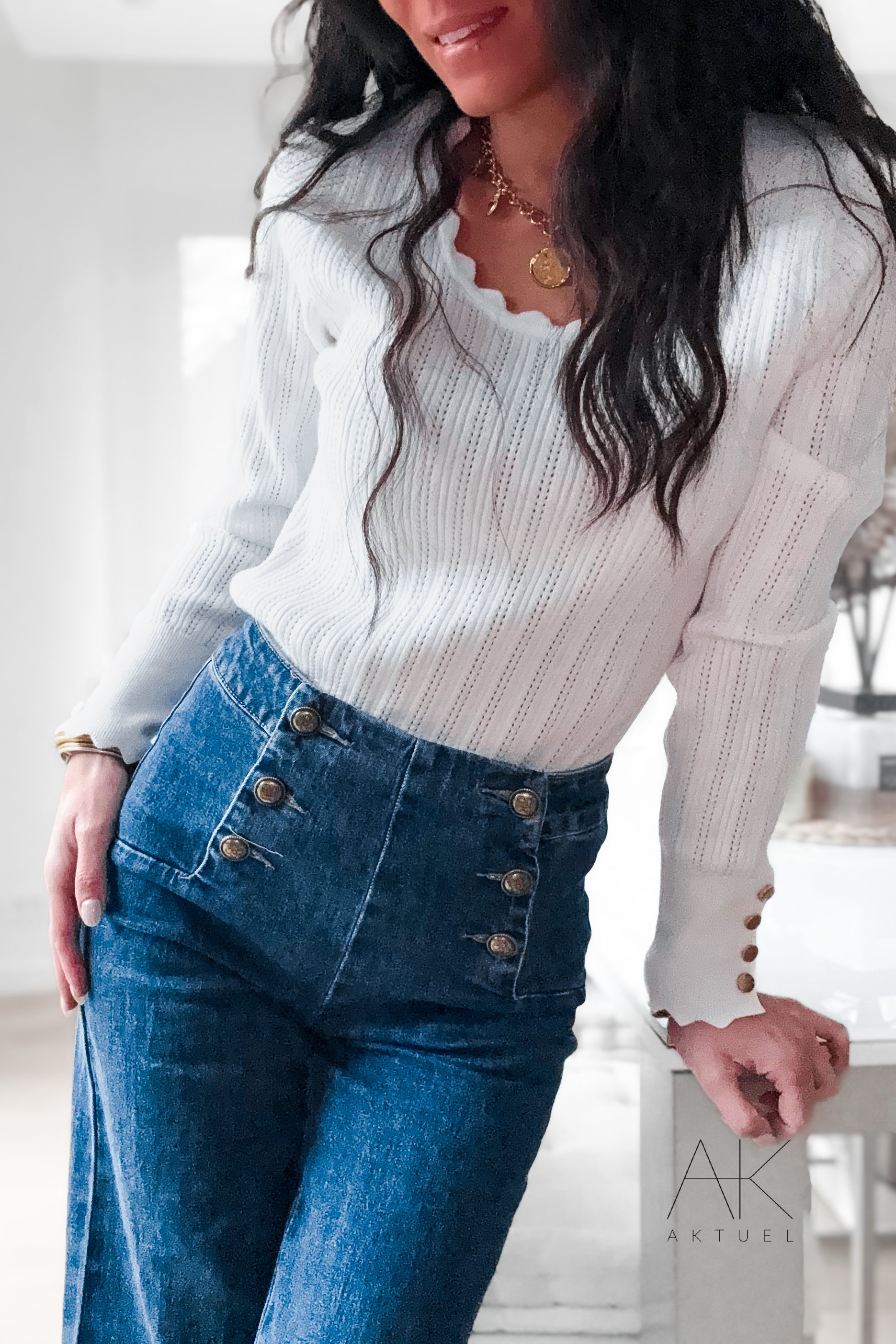 Pull fin blanc à maille ajourée