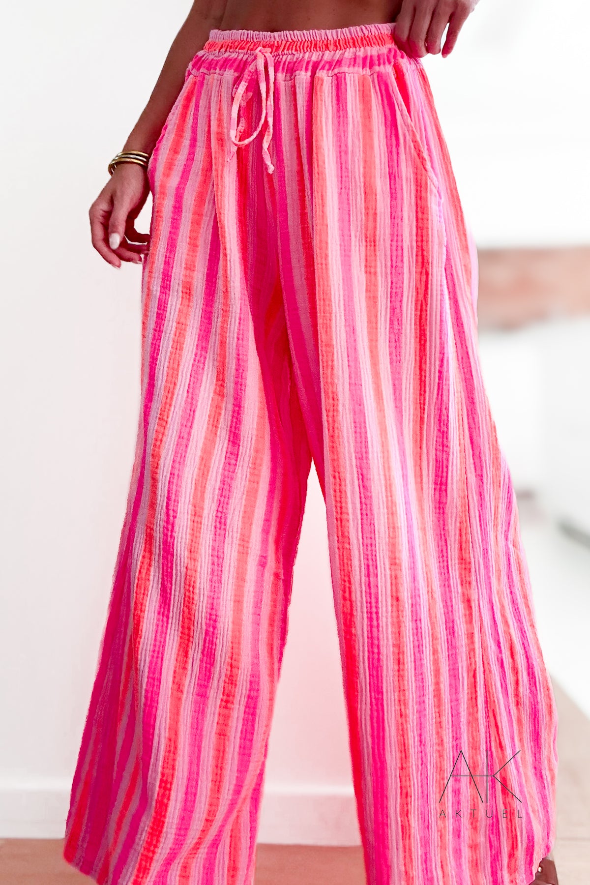 Pantalon large en gaze de coton à rayures fuschia et orange
