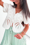 Top blanc à broderies palmier