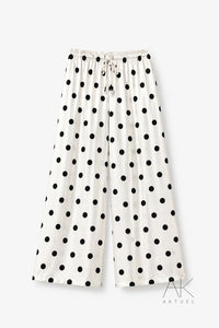 Pantalon fluide satiné écru à pois