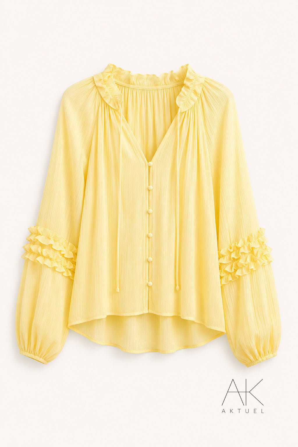 Chemisier jaune pastel volanté